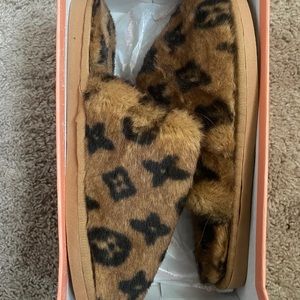 Fur slippers .